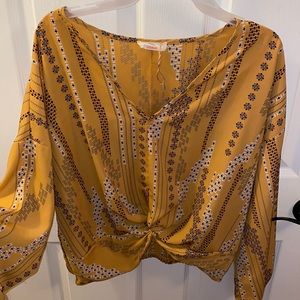 Mustard V-neck shirt